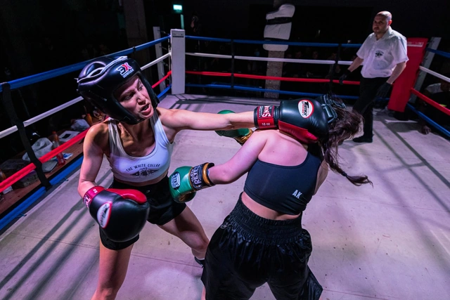 Two women boxing at Backyard Bouts