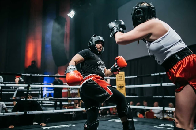 Shameen in a Muay Thai bout, on the attack against her opponent